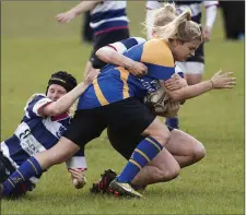  ??  ?? Rathdrum’s Nicola Souster powers forward against Athy.