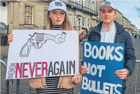  ??  ?? Ellie and Jack Crozier, who lost their sister Emma in the Dunblane shooting, outside the US Embassy in Edinburgh.