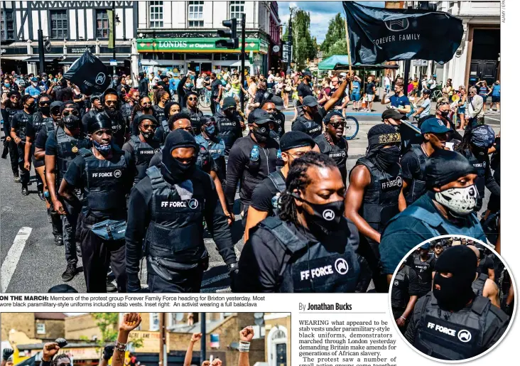  ??  ?? ON THE MARCH: Members of the protest group Forever Family Force heading for Brixton yesterday. Most wore black paramilita­ry-style uniforms including stab vests. Inset right: An activist wearing a full balaclava