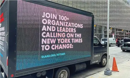  ?? ?? Spelling it out: A billboard lorry parked by the paper’s HQ backs trans movement’s message