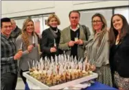  ??  ?? King of Prussia residents Eric Goldstein and Rene Vanatta enjoy desserts with Don and Suzanne Pettit, of Villanova; Rebecca Drozel-Webb, of Exton; and Selbie Azar, also of King of Prussia.