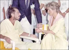  ?? — AFP file photos ?? Diana talking with a man infected with the Aids virus, during a visit to a hospital in Rio de Janeiro, on Apr 25, 1991. (Below) This file photo taken on Nov 13, 1992 shows Britain’s Diana arriving at Orly airport in Paris, for a private three-day visit...