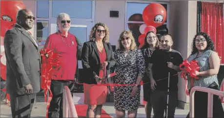  ?? ?? Celebratin­g the DSPS Building grand opening with a ribbon cutting ceremony. From left to right, IVC interim Superinten­dent/President Dr. Lennor Johnson, IVC Trustee Jerry Hart, IVC board President Karla Sigmond, IVC Trustee Hortencia Armendariz, DSPS Director Wendy Prewett, DSPS student Brandon Solano and DSPS student Clarissa Cardenas.