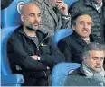  ?? EPA ?? Manchester City manager Pep Guardiola, left, sits in the stands.