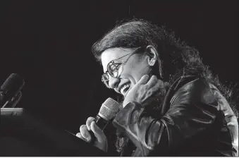  ?? [RYAN GARZA/DETROIT FREE PRESS] ?? U.S. Rep. Rashida Tlaib speaks before Democratic Presidenti­al Candidate U.S. Sen. Bernie Sanders during a campaign rally March 6 at the TCF Center in downtown Detroit.