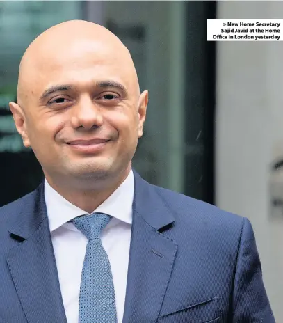  ??  ?? > New Home Secretary Sajid Javid at the Home Office in London yesterday