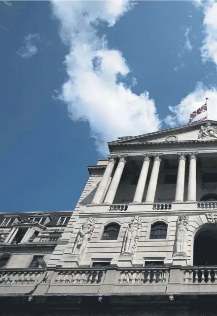  ?? ?? The Bank of England is continuing its longrunnin­g fight to control inflation. Right, Britain’s housing market has been impacted by high interest rates, stifling activity