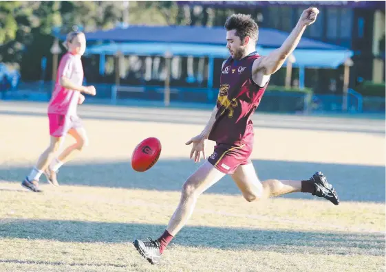  ??  ?? Palm Beach Currumbin’s Jesse Derrick is done for the QAFL season after having his ban increased for a sling tackle on Broadbeach’s Robert Blood (below).