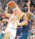  ?? PAT SULLIVAN / ASSOCIATED PRESS ?? Tennessee’s Michelle Marciniak shoots over Connecticu­t’s Carla Berube on March 29, 1996, in Charlotte,
N.C. Marciniak scored 21 points as Tennessee defeated Connecticu­t in overtime 88-83.