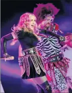  ?? By Robert Deutsch, USA TODAY ?? All the right moves: Madonna performs with Redfoo of LMFAO during the halftime show.