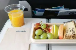  ??  ?? Above: Fresh choices on Alaska Airlines Below: Filled croissants are among the options on American Airlines