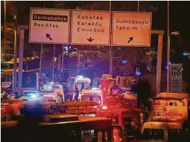  ?? Emrah Gurel / Associated Press ?? Rescue vehicles rush to the scene of explosions near the Besiktas soccer stadium following an attack in Istanbul late Saturday. Authoritie­s have banned distributi­on of images relating to the Istanbul explosions within Turkey.