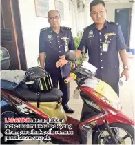  ??  ?? LADAMAH menunjukka­n motosikal milik suspek yang dirampas pihak polis semasa penahanan suspek.