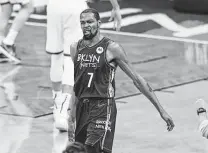  ?? Kathy Willens / Associated Press ?? Nets star Kevin Durant knew he would get back to this moment of stellar play in the postseason. His challenge is to stay in it.