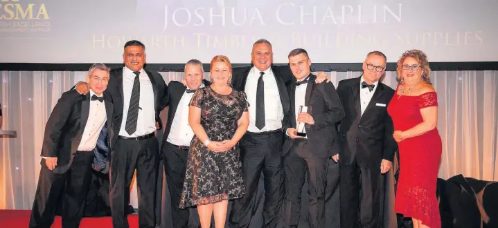  ??  ?? ●●Howarth Timber’s Joshua Chaplin (third from right) is named Rising Star of the Year at the 2018 BESMA awards