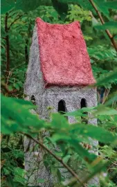  ??  ?? ABOVE: This pair appear to be having a private conversati­on in a garden in Portsmouth, U.K. RIGHT: Glenn G. Smith’s works are displayed in a small sculpture garden at the Homer Watson House & Gallery at 1754 Old Mill Rd. in Kitchener.