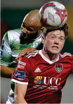  ??  ?? Heads up: Cork City’s Cian Murphy against Ethan Boyle of Rovers
