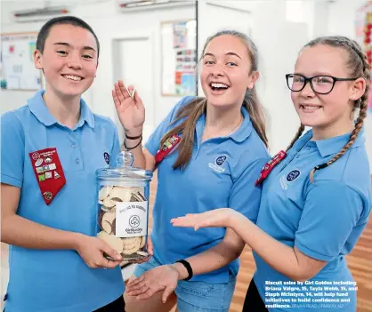  ?? BEVAN READ / FAIRFAX NZ ?? Biscuit sales by Girl Guides including Briana Valgre, 15, Tayla Webb, 15, and Steph McIntyre, 14, will help fund initiative­s to build confidence and resilience.