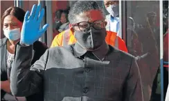  ??  ?? Mbalula at a bus depot in Meadowland­s West, Soweto. The minister said his department was working towards introducin­g sanitising booths at most taxi ranks.