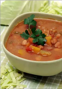  ?? PHOTOS BY NICK KOON — MEDIA NEWS ?? Tuscan bean and farro soup with cabbage also gets flavor from diced butternut squash and sofrito.