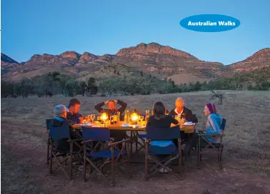  ??  ?? Above right: Gourmet meals served under the stars. Photo by graham Michael FreemaG
Middle right: Sundowner drinks as the sun sinks behind Wilpena Pound. Photo by Paul bester
Below left: Feel the space! Photo by Matt Swords
Below riight: Walkers at sunrise.