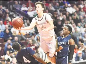  ?? Peter Hvizdak / Hearst Connecticu­t Media ?? Grayson Herr of Farmington High drives to the basket against Amistad Academy of New Haven in the boys Division III championsh­ip game Sunday afternoon at Mohegan Sun Arena in Uncasville. Farmington won, 55-45.