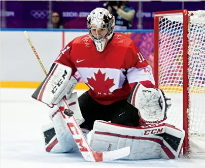  ??  ?? GOLDEN FINISH
Price was Canada’s go-to stopper at the
2007 world juniors,
2014 Olympic Games and 2016 World Cup.
