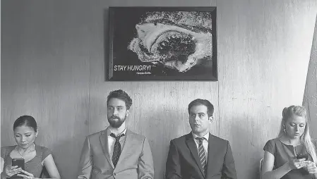  ??  ?? Matt (Matt Ingebretso­n, left) and Jake (Jake Weisman) enjoy an office meeting in “Corporate.” COMEDY CENTRAL