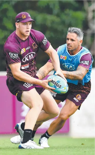  ?? Picture: AAP ?? WORKING HARD: Thomas Flegler (left) and Corey Parker training before the NRL Nines last week. Flegler wants to emulate Parker and make the Broncos’ No.13 jersey his this season