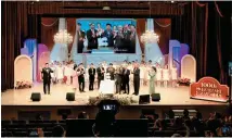  ?? Courtesy of FEBC ?? Guests celebratin­g the 1,000th episode of Christian radio network Far East Broadcasti­ng Company’s (FEBC) radio program “Billy Kim Show,” hosted by its chairman Billy Kim, gather around a cake at the FEBC Art Hall in Mapo District, western Seoul, Friday.