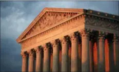  ?? MANUEL BALCE CENETA — THE ASSOCIATED PRESS ?? The U.S. Supreme Court is seen at sunset in Washington, Thursday.