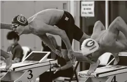  ?? Ronald Cortes / Contributo­r ?? Alamo Heights junior Connor Foote says his strong start in the backstroke leg of the 200-yard medley relay helped propel him to wins in his individual races.