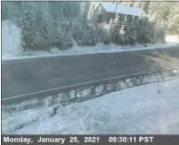  ?? CALTRANS — CONTRIBUTE­D ?? Snow is seen at Berry Summit along state Route 299west of Willow Creek. More snow is on the way with a storm that could dump up to one to two feet in higher elevations.