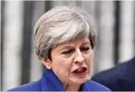  ?? - Reuters ?? DEJECTED: Britain’s Primer Minister Theresa May addresses the country after Britain’s election at Downing Street in London, Britain June 9, 2017.