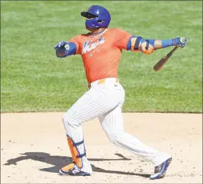  ?? Kathy Willens / Associated Press ?? The Mets’ Yoenis Cespedes bats in a simulated game as part of summer training camp workout at Citi Field.