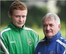  ??  ?? Colm Murphy with mentor Georgie O’Callaghan after signing for Limerick United and being selected on the Irish U-17 squad.