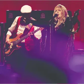  ?? DAVID BLOOM/FILES ?? Both bassist John Mcvie and singer Stevie Nicks experience­d painful breakups as Rumours was being recorded.