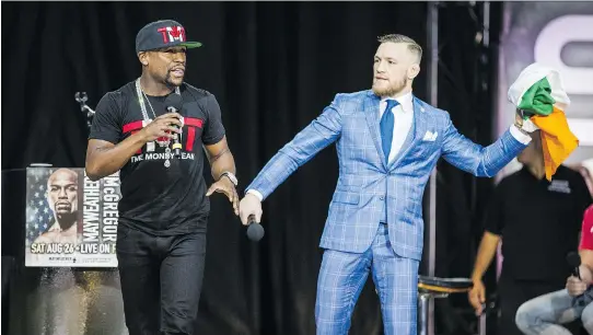  ?? ERNEST DOROSZUK ?? Undefeated boxing champion Floyd Mayweather has taken on the role of villain while UFC champion Conor McGregor is the foul-mouthed people’s choice on this four-city tour to promote their upcoming boxing match, which made a stop on Wednesday in Toronto,...