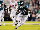  ?? Mitchell Leff/Getty Images ?? Eagles receiver A.J. Brown carries the ball against the Giants during the first half on Jan. 21 in Philadelph­ia.