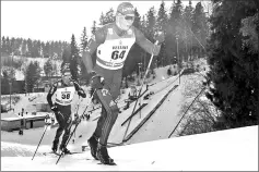  ?? – Photo by Roni Rekomaa via Reuters ?? Alexander Bolshunov of Russia and Jonas Baumann of Switzerlan­d compete in Cross-Country Skiing for the Lahti Ski Games in Finland.