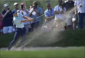  ?? BRAD HORRIGAN — HARTFORD COURANT ?? Jordan Spieth hits his second shot on the ninth hole during the third round of the Travelers Championsh­ip on June 24 at TPC River Highlands in Cromwell, Conn.