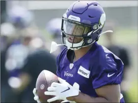  ??  ?? In this July 23 file photo, Minnesota Vikings tight end Irv Smith Jr. takes part in an NFL football team training camp in Eagan, Minn. AP PHOTO/JIM MONE