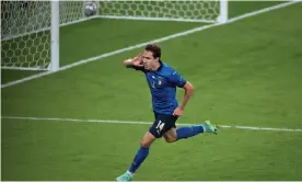  ?? Photograph: Visionhaus/Getty Images ?? Federico Chiesa celebrates after giving Italy the lead in the semi-final against Spain.