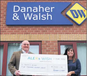  ??  ?? ■ Photo shows Dan Danaher, managing director of Danaher & Walsh, and Emma Hallam, founder of Alex’s Wish.