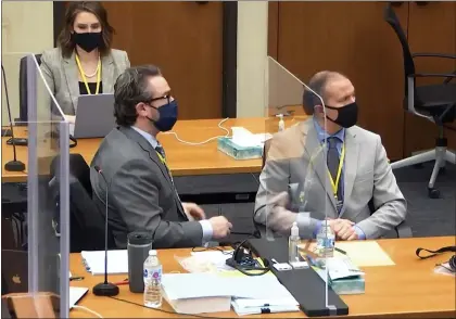  ?? COURT TV — VIA THE ASSOCIATED PRESS ?? A video image of Hennepin County Judge Peter Cahill presiding over jury selection in the trial of former Minneapoli­s police officer Derek Chauvin on Tuesday in Minneapoli­s. Coronaviru­s safety precaution­s include the judge wearing a mask.