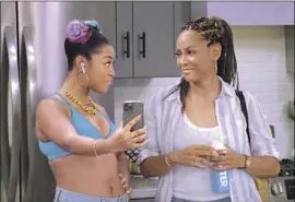  ?? ALLBLK ?? RAP LEGEND MC Lyte, right, plays rap legend Lana Crawford to Precious Way’s rapper Luscious T. in “Partners in Rhyme” on the streamer ALLBLK.