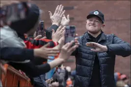  ?? KARL MONDON — BAY AREA NEWS GROUP ?? San Francisco Giants starting pitcher Logan Webb walks the “orange” carpet during the team’s FanFest event on Feb. 4 at Oracle Park in San Francisco.