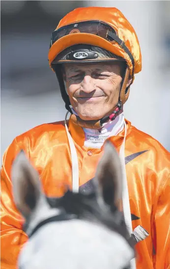  ??  ?? Jockey Damian Browne does not enjoy road travel but was happy to be in the winner’s circle.