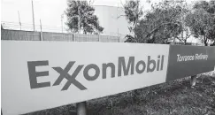  ?? ASSOCIATED PRESS FILE PHOTO ?? The sign for the Exxon Mobil Torrance Refinery is seen in Torrance, Calif.