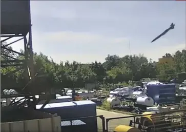  ?? AN IMAGE Ukrainian Presidenti­al Press Office ?? from video is said to show the Russian missile just before impact Monday at the shopping mall in Kremenchuk, Ukraine. At least 18 people were killed and 20 are missing, though body parts have been found.